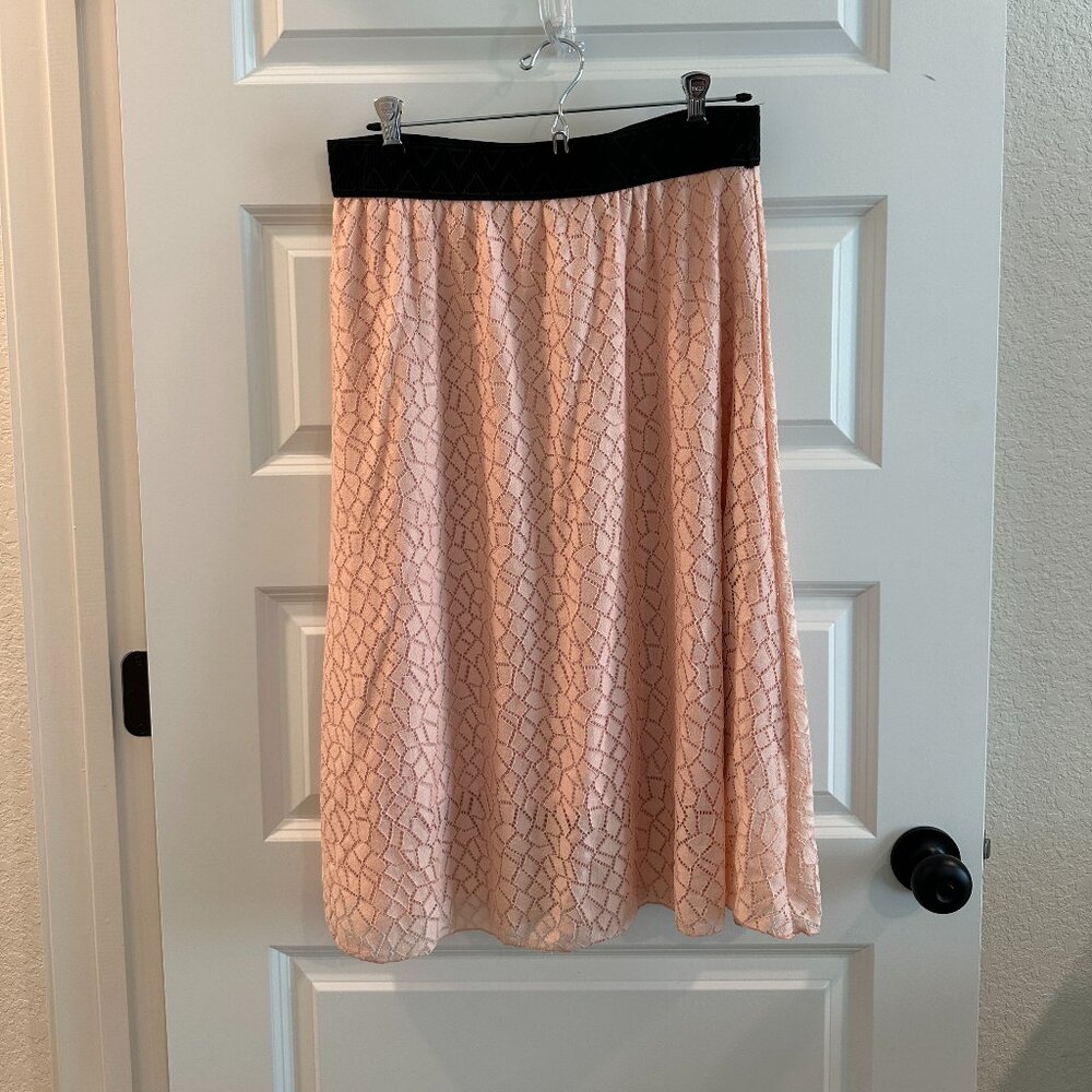 LuLaRoe L Lola skirt in pink lace with pink lining and black waistband